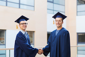 Image showing smiling students in mortarboards