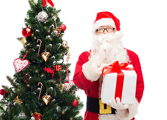 Image showing man in costume of santa claus with gift box