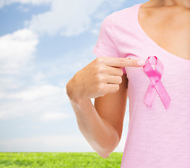 Image showing close up of woman with cancer awareness ribbon