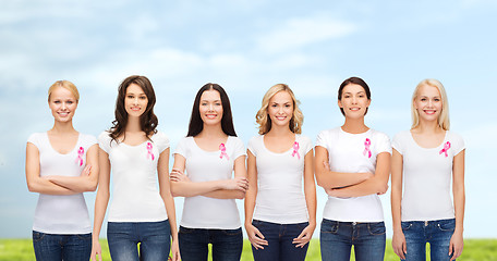 Image showing smiling women with pink cancer awareness ribbons