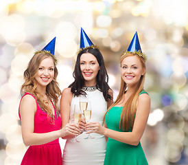 Image showing smiling women holding glasses of sparkling wine