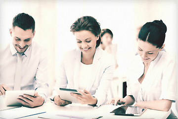 Image showing business team working with tablet pcs in office