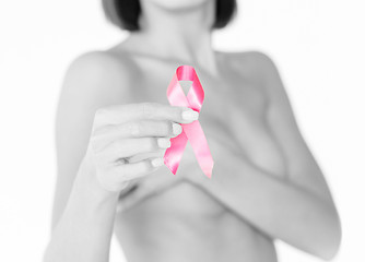 Image showing hand holding pink breast cancer awareness ribbon