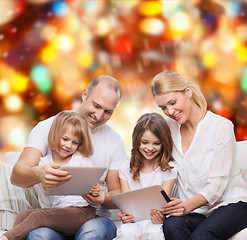 Image showing happy family with tablet pc computers