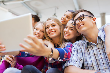 Image showing group of smiling students with tablet pc