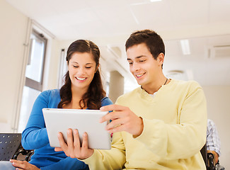 Image showing group of smiling students with tablet pc