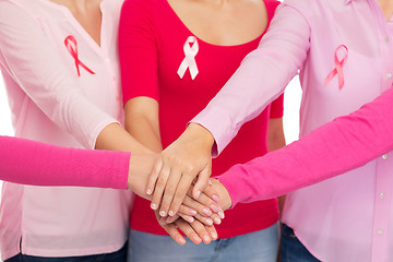 Image showing close up of women with cancer awareness ribbons