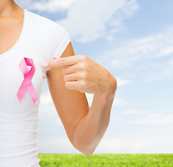 Image showing close up of woman with cancer awareness ribbon