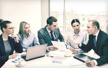 Image showing business team with laptop having discussion