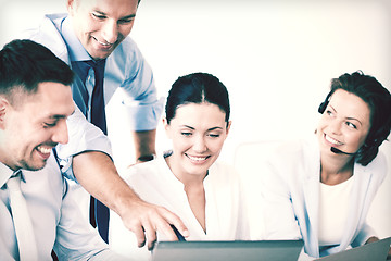 Image showing group of people working in call center