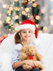 Image showing smiling little girl with teddy bear