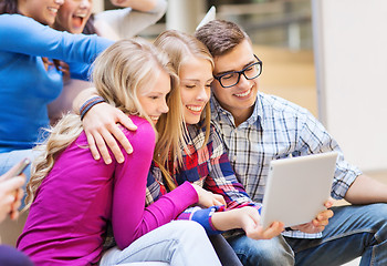 Image showing group of smiling students with tablet pc