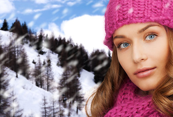 Image showing close up of smiling young woman in winter clothes