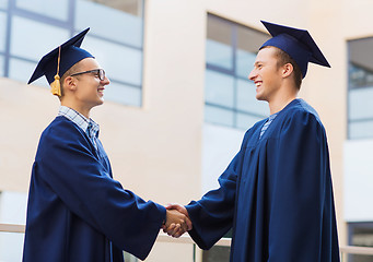 Image showing smiling students in mortarboards