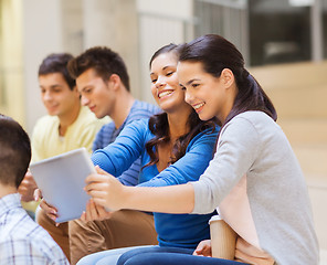 Image showing group of smiling students with tablet pc