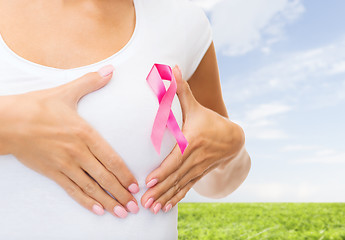 Image showing close up of woman with cancer awareness ribbon