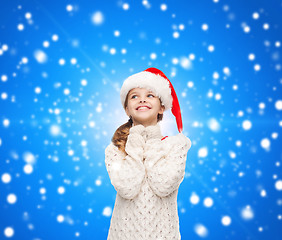 Image showing dreaming girl in santa helper hat