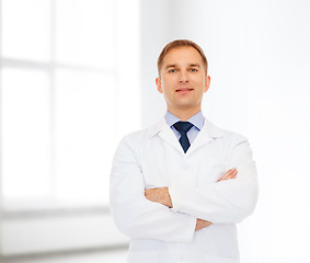 Image showing smiling male doctor in white coat