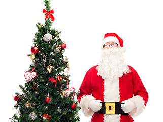 Image showing man in costume of santa claus with christmas tree