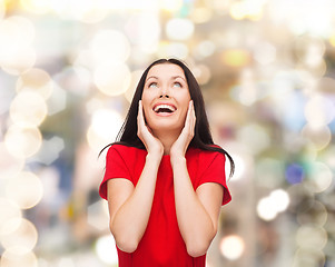 Image showing smiling woman in red dress