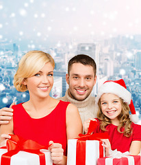 Image showing happy family with gift boxes
