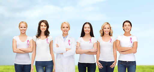 Image showing smiling women with pink cancer awareness ribbons