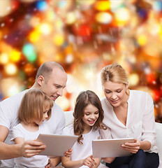 Image showing happy family with tablet pc computers