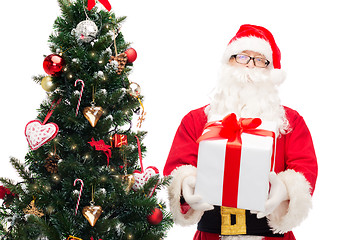 Image showing man in costume of santa claus with gift box