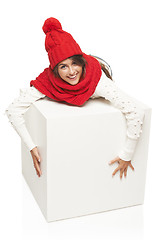 Image showing Winter woman hugging big white box