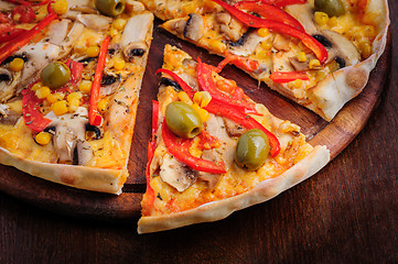 Image showing Pizza with Mozzarella, Mushrooms, Olives and Tomato Sauce