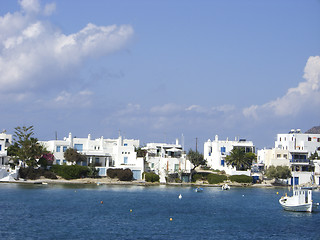 Image showing typical beach community with Cyclades style white house blue doo