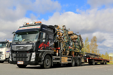 Image showing Volvo FM 460 Hauls Multiva Seedbed Cultivator