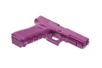 Image showing Dirty pink training gun isolated on white