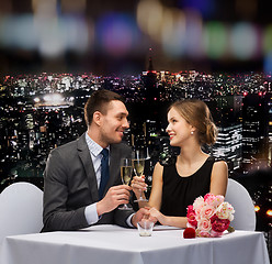 Image showing couple with glasses of champagne at restaurant