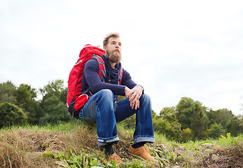Image showing man with backpack hiking