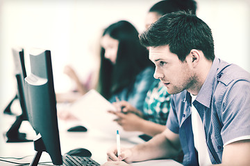 Image showing student with computer studying at school