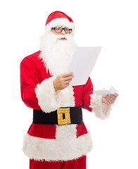 Image showing man in costume of santa claus with letter