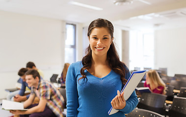 Image showing group of smiling students in lecture hall