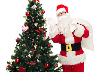 Image showing santa claus with bag and christmas tree