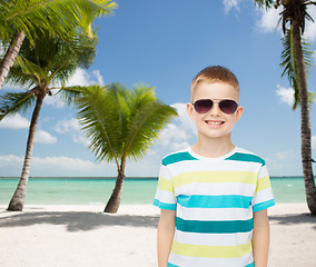 Image showing smiling little boy over green background