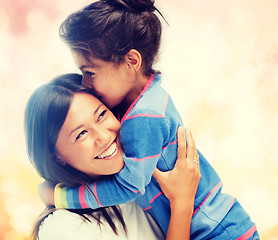 Image showing hugging mother and daughter