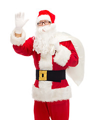 Image showing man in costume of santa claus with bag