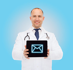 Image showing smiling male doctor with stethoscope and tablet pc