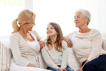 Image showing smiling family at home