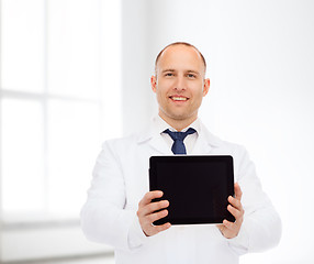 Image showing smiling male doctor with tablet pc