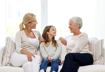 Image showing smiling family at home