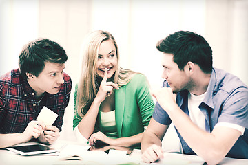 Image showing group of students gossiping at school