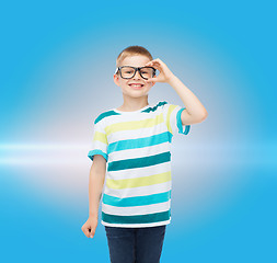 Image showing smiling little boy in eyeglasses