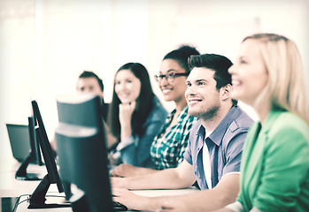 Image showing students with computers studying at school