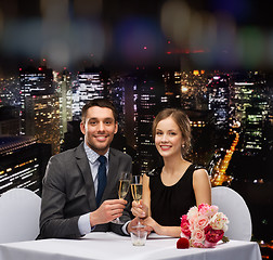 Image showing couple with glasses of champagne at restaurant